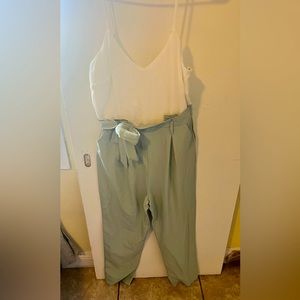 New jumpsuit no tag, white with green size large but fits like medium